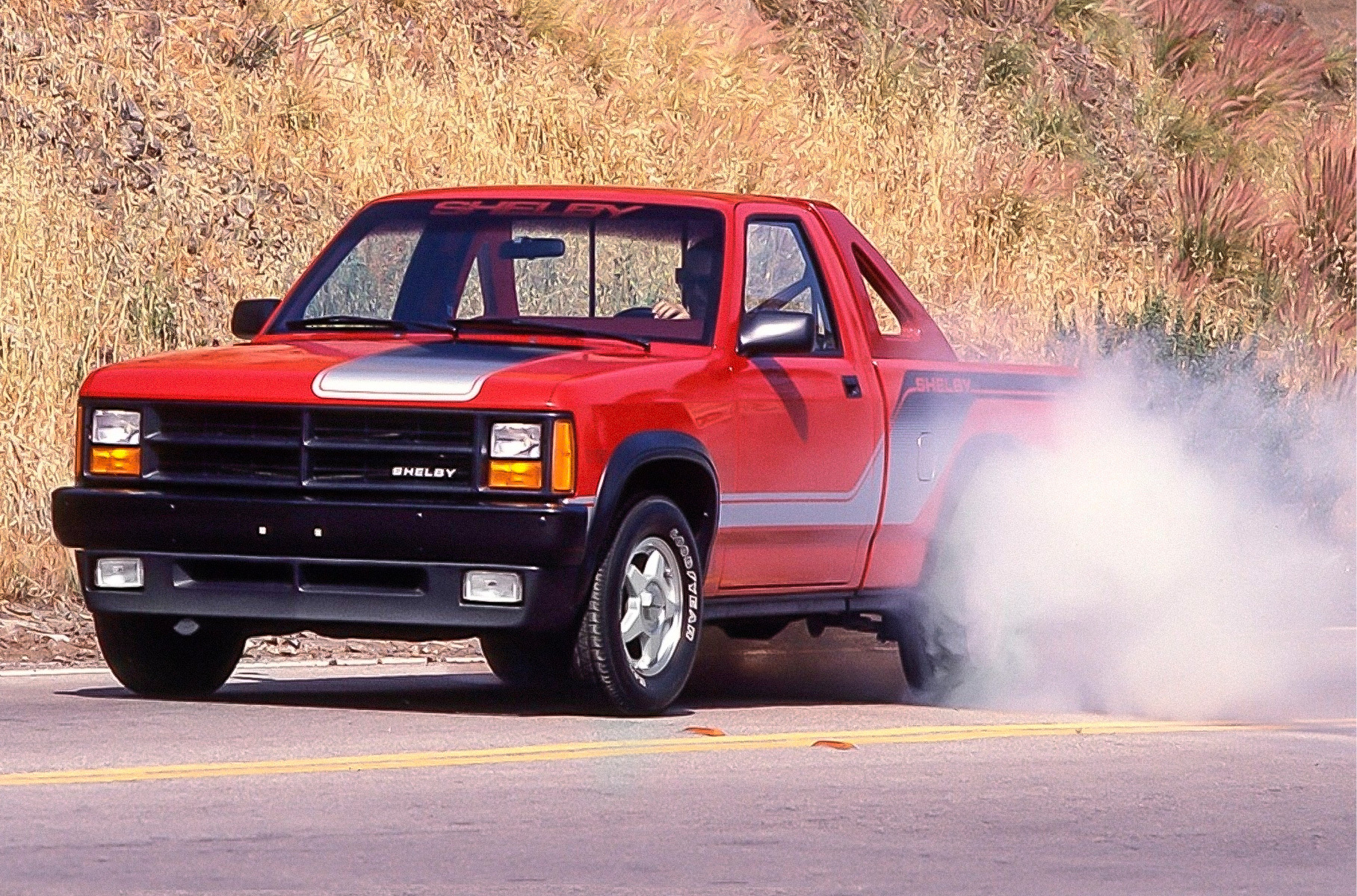 ###  Среднеразмерный пикап Dodge с большими буквами «SHELBY» на кузове… Да, 1980-е были действительно странным временем для великого американского тюнера.