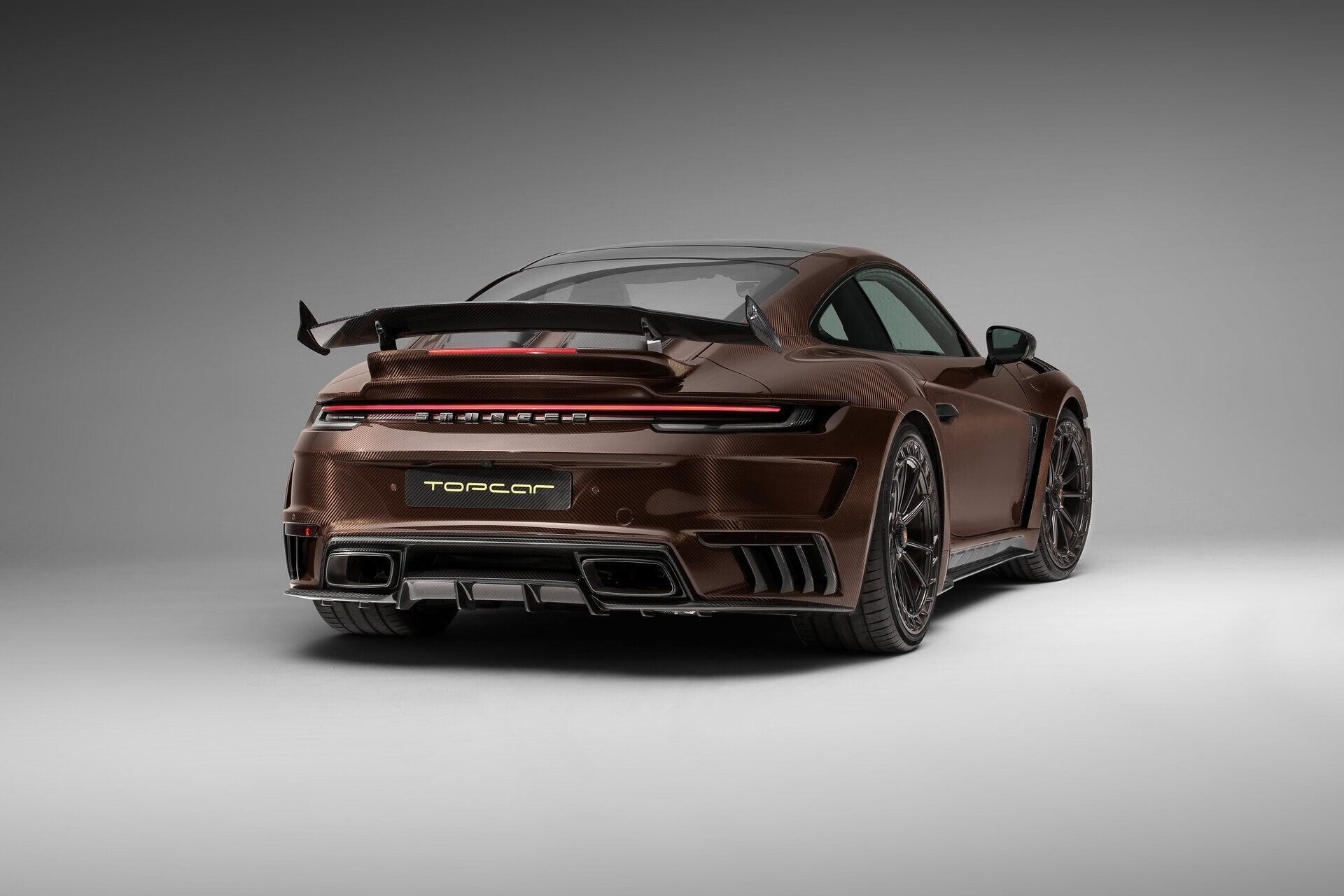 TopCar показал эксклюзивный Porsche 911 Turbo S в коричневом углепластике