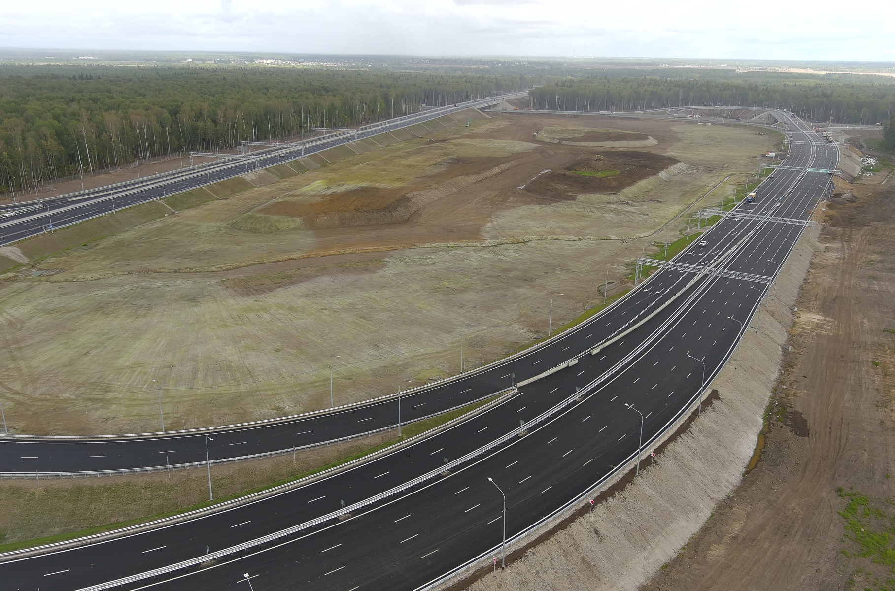 Строительство дорог в московской области. ЦКАД м12. Строящаяся трасса м12. Открытый участок дороги м12. Трасса.