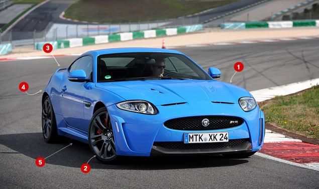 1. Сердце XKR-S - форсированный до 550 лошадиных сил компрессорный мотор AJ-V8, развивающий 680 Нм крутящего момента. У него была увеличена с 9,1:1 до 9,5:1 степень сжатия, установлена новая выпускная система, а также перепрограммирована управляющая электроника.

2. Колесные диски разной размерности (задние на дюйм шире передних) -- кованные, они на 4,8 килограмма легче обычных легкосплавных. Тормоза - диаметром 380 мм спереди и 375 мм сзади.

3. Аэродинамический обвес - не бутафория, он уменьшает подъемную силу на 25 процентов.

4. Передние и задние пружины стали жестче на 28 процентов. В передней подвеске используются модернизированные, более жесткие поворотные алюминиевые кулаки.

5. Дорожный просвет уменьшен на 10 миллиметров.